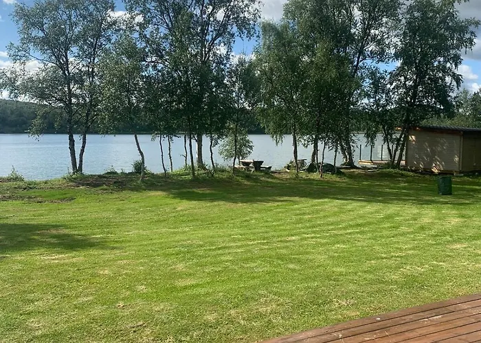 Nyaraló With Good Standard Next To River Neiden
